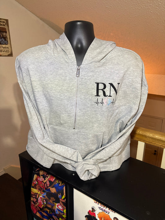 Quarter-zip cropped pullover sweatshirt with pocket and hood or collar